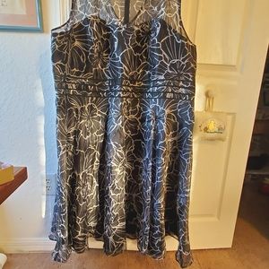 Party dress Roman's 32 W black with silver flowers.Sheer top, lined bodice/skirt